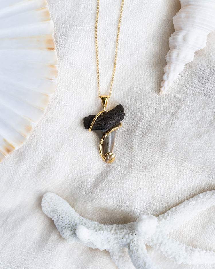 gold fossil swirl necklace