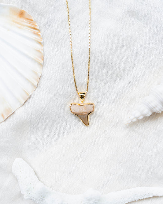 gold moana necklace