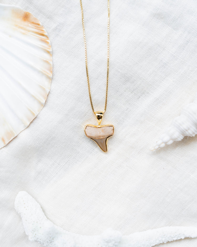 gold moana necklace