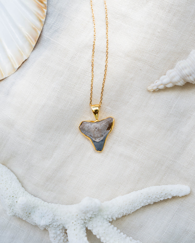 gold moana necklace