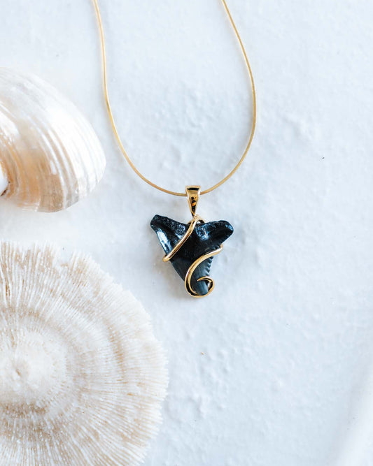 gold fossil swirl necklace