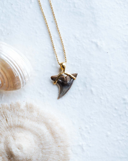 gold hiu necklace