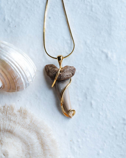 gold fossil swirl necklace