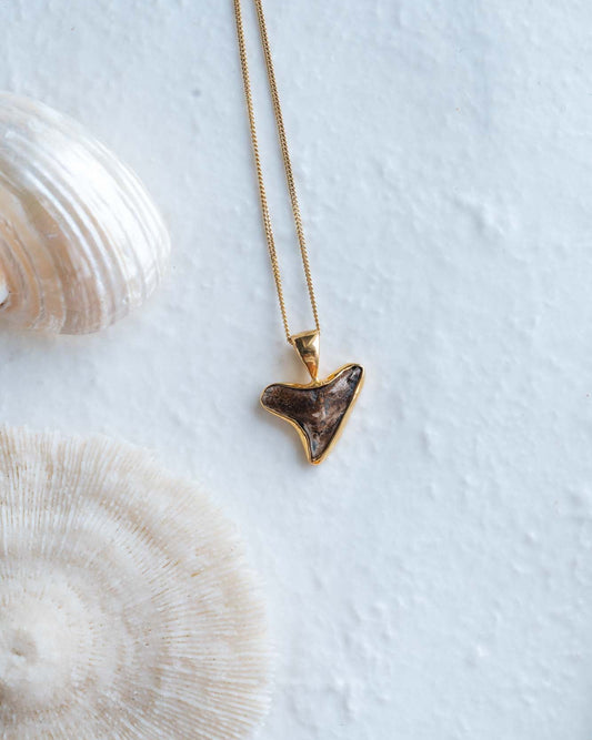 gold moana necklace