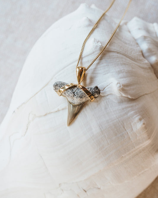 gold hiu necklace