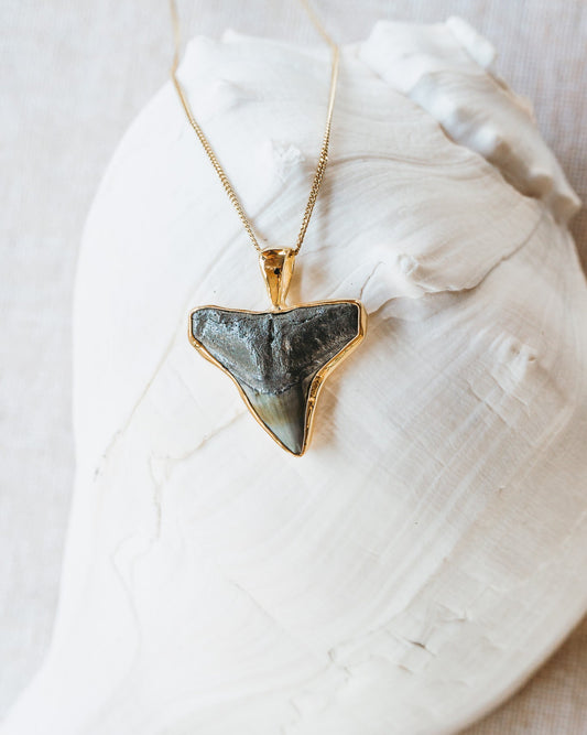 gold moana necklace