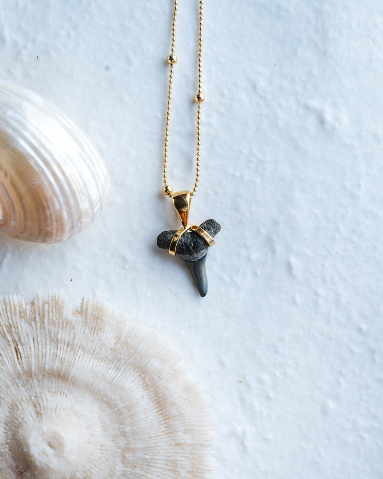 gold hiu necklace